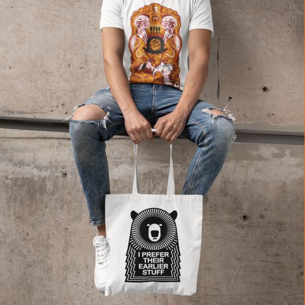 White Tote Bag with a hipster bear and the words I Prefer Their Earlier Stuff