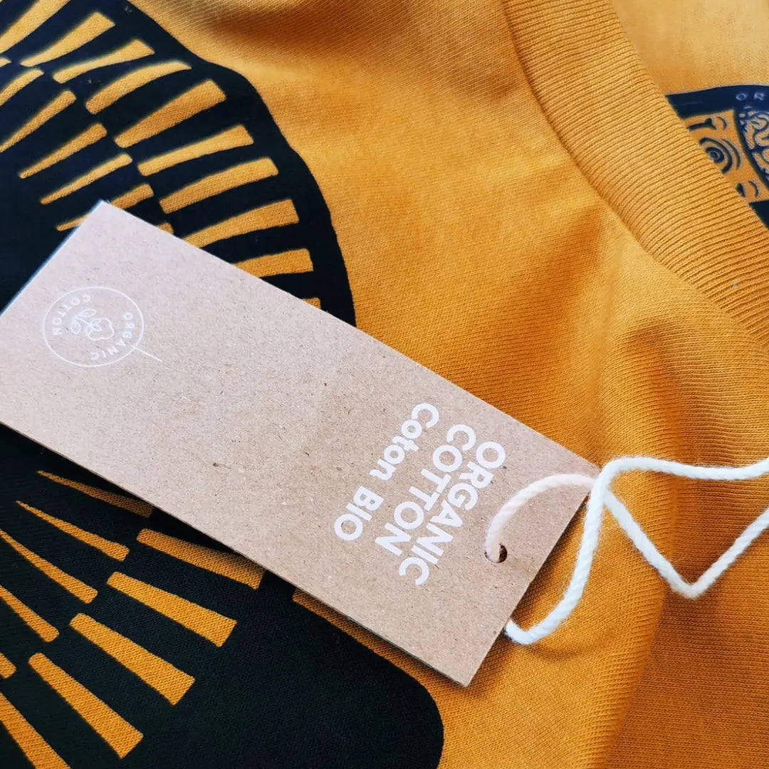organic-cotton-band-tee-closeup-mustard-fabric-eco-tag-indie-rock-ethical-fashion