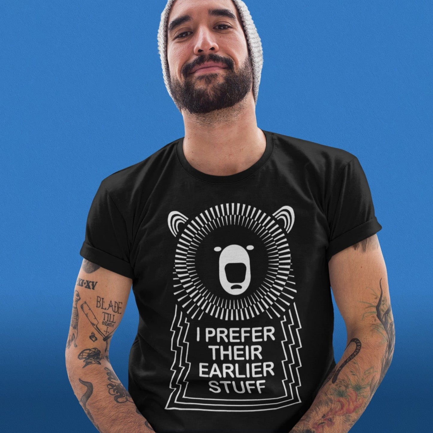Front view of a male model wearing the muso bear 80s band T-Shirt in Black