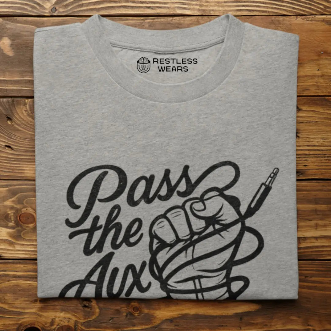 folded-pass-the-aux-t-shirt-showing-aux-cable-meaning-in-90s-grunge-style